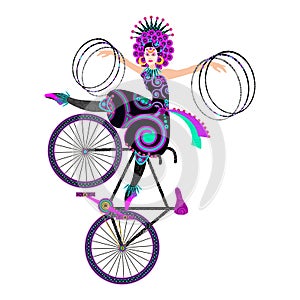 Trick with hula hoops by circus girl on an artistic bicycle.