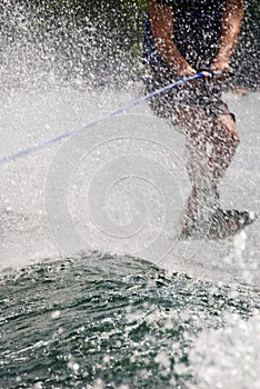 Trick Skier Behind Water Spray