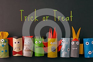TRiCK or TREAT Halloween monsters doll from toilet paper tube roll. Creative DIY for kids. Home decor for party. Paper handie