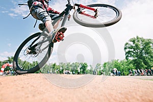 Tricks on the bike. young man jumps on a mountain bike. Cycling Sports Concept