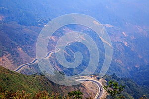 Tricky, sharp curve, s-curve road on mountain to Luang Pra Bang Laos photo