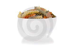 Tricolore fusilli pasta in a bowl