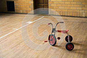 Tricycle in empty gym