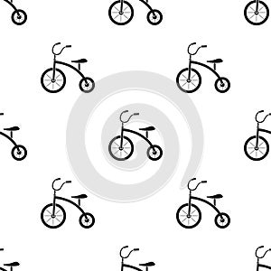 Tricycle icon in black style isolated on white background. Play garden pattern