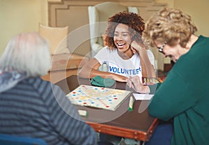 She tries to make a difference every day. a volunteer working with seniors at a retirement home.