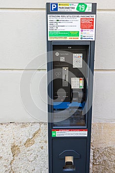 Trieste, Italy, October 25, 2025 modern parking meter with digital payment options