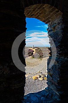 Trig point seen through arch, Parys Mountain.