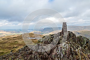 The trig point on the top of Place Fell, in Cumbria
