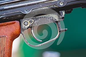 The trigger of the machine gun . The machine gun is ready for firing_