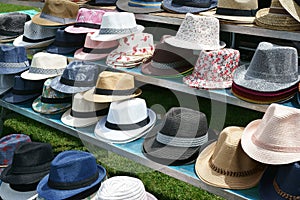 Trilby hats for sale on display Outdoor Sunlight