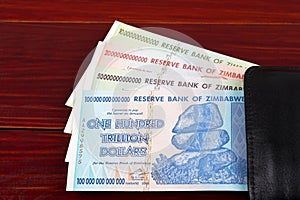 Trillion dollars from Zimbabwe, in the black wallet photo