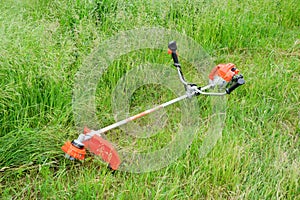 Trimer gascosis with leaf for mowing grass and shrubs
