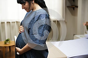 A trimester pregnant woman photo
