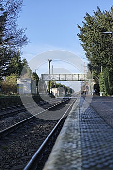 Trimley station platform, looking towards the level crossing & foot bridge.