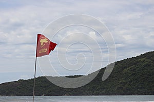 Trindade, Paraty/Rio de Janeiro/Brazil - 01-19-2020: Praia do Meio beach. Strong waves, dangerous sea, drowning risk photo