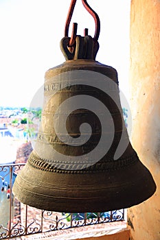 Trinidad, Cuba. Bell on the tower of the ancient building Convento de San Francisco de AsÃ­s, close-up