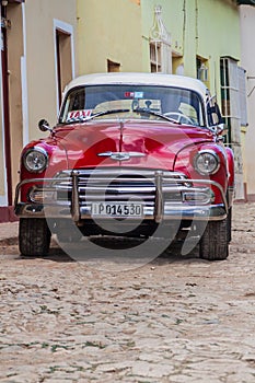 TRINIDAD, CUBA - FEB 8, 2016: Vintage Chevrolet taxi on a street in the center of Trinidad, Cub