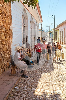 TRINIDAD, CUBA - MARCH 30, 2012: Street musicians perform songs