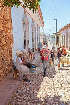 TRINIDAD, CUBA - MARCH 30, 2012: Street musicians perform songs