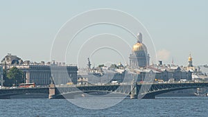 Trinity Troitsky bridge and the Isaac`s Cathedral in the summer - St Petersburg, Russia