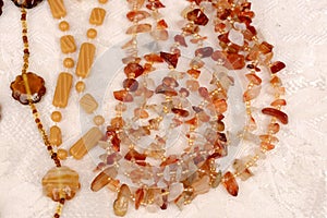 Trinkets on white cloth at street market, Chiavari, Italy