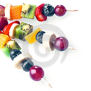 Trio of colourful tropical fruit kebabs