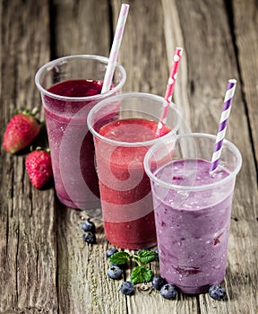 Trio of delicious berry smoothies photo