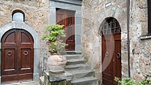 A trio of doors in a Tuscan hill town