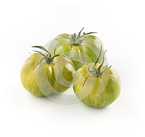 Trio of fresh green tiger tomatoes