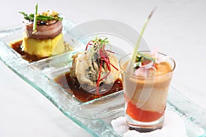 Trio of gourmet entrees, asian food