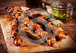 Trio of grilled barbecued beef kebabs