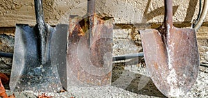 A trio of old, rusted shovels that still manage to get a job done