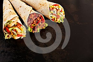 Trio of Tex Mex Fajita Wraps on Dark Counter