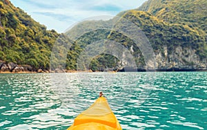 Trip on colourful kayak