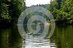 Trip by raft on the river during summer