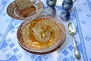 Tripe soup on a rustic table