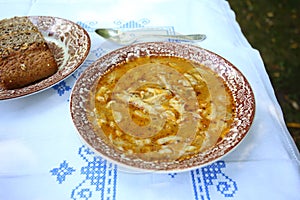 Tripe soup on a rustic table