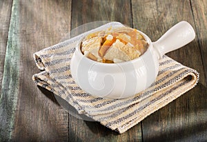 Tripe soup, traditional Colombian food - Wooden background