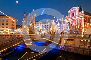 Triple bridge, illuminated for New Years celebration, Ljubljana, Slovenia