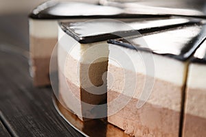 Triple chocolate layer mousse cake with glaze