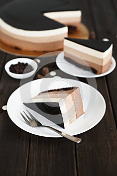 Triple chocolate layer mousse cake with glaze