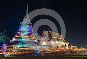 Triple Circumambulation around old pagoda of Trapangtong Temple in Sukothai Thailand photo