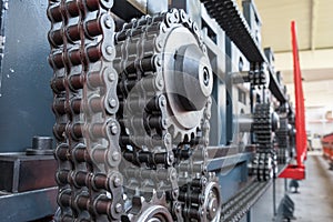 Triple strand roller chain with three sprockets