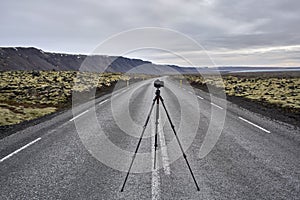 Tripod with camera on county roadway