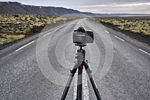 Tripod with camera on county roadway