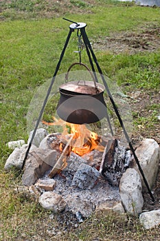 Tripod campfire cooking photo