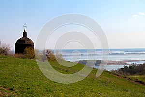 Tripoli. Wooden church in the village Vitachev