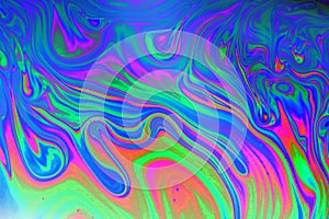 Trippy, psychedelic abstract in blue, green, orange and pink