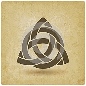 Triquetra in circle old background