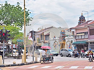 Trishaw at the junction of Lebuh Chulia with Jalan Masjid Kapitan Keling formerly Pitt Street in George Town
